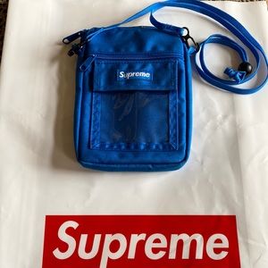 Supreme crossbody adjustable bag. Comes with free Supreme bag.